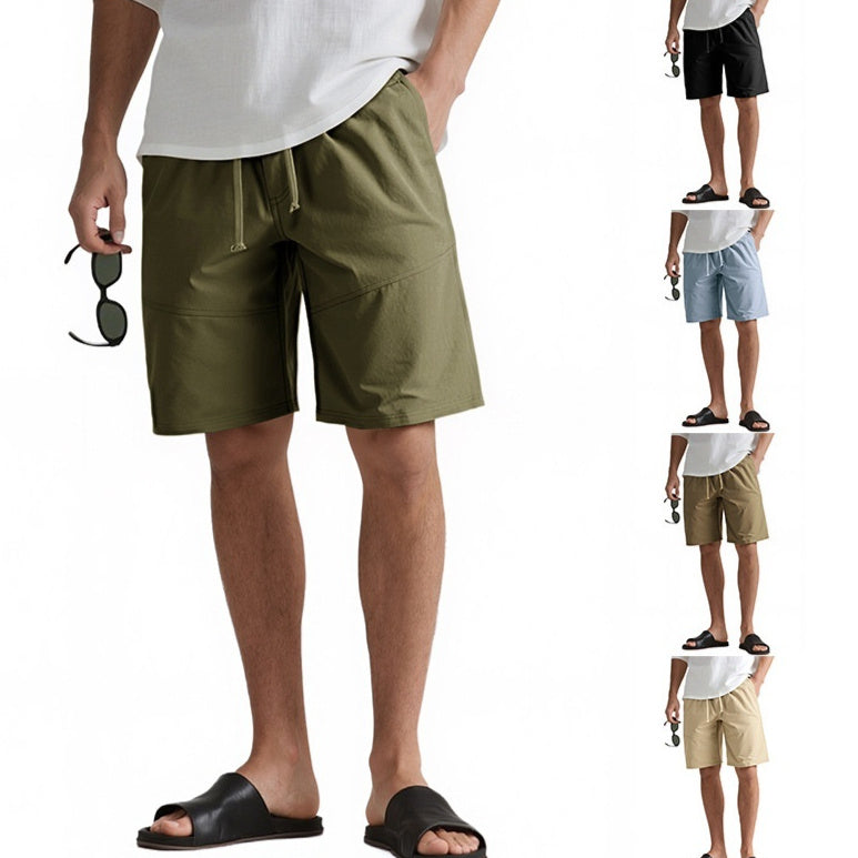 Men's casual drawstring shorts in olive, black, blue, brown, and beige, paired with white tee and black slide sandals