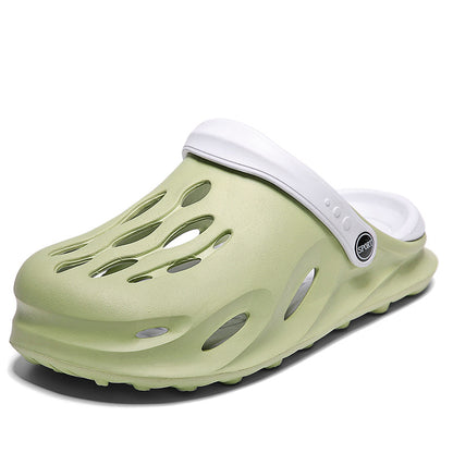Light green sport clog with white adjustable strap and ventilation holes