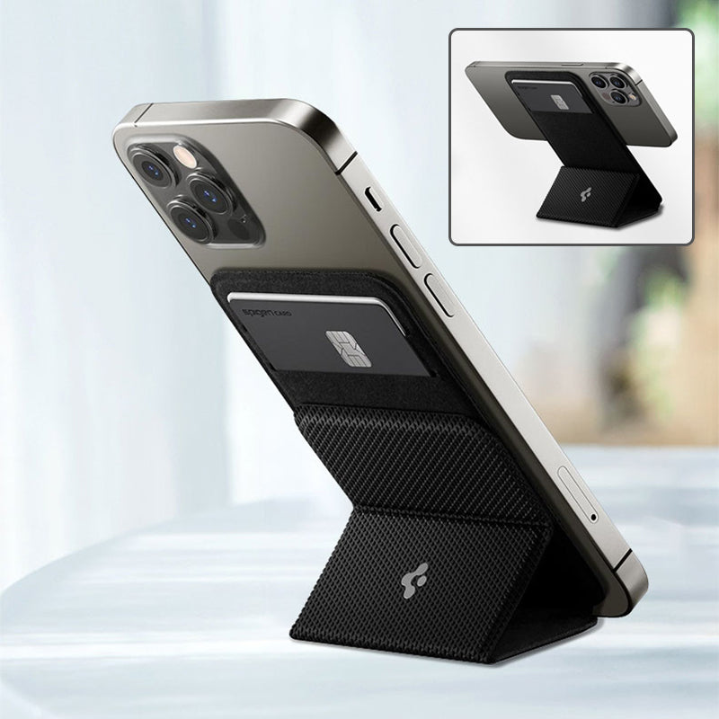 Modern smartphone with black magnetic wallet and foldable stand on table with blurred background