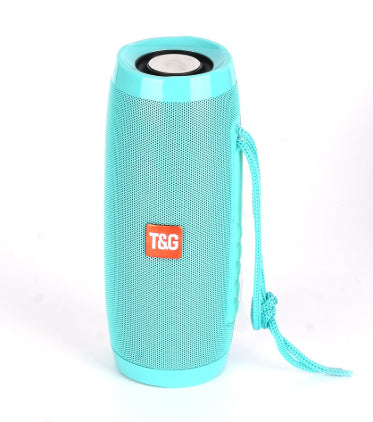 Blue T&G portable Bluetooth speaker with mesh grille and carrying strap on white background
