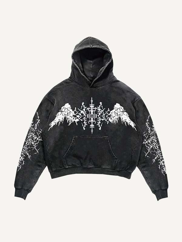 black hooded sweatshirt with white abstract angel wing design across chest and intricate patterns on sleeves