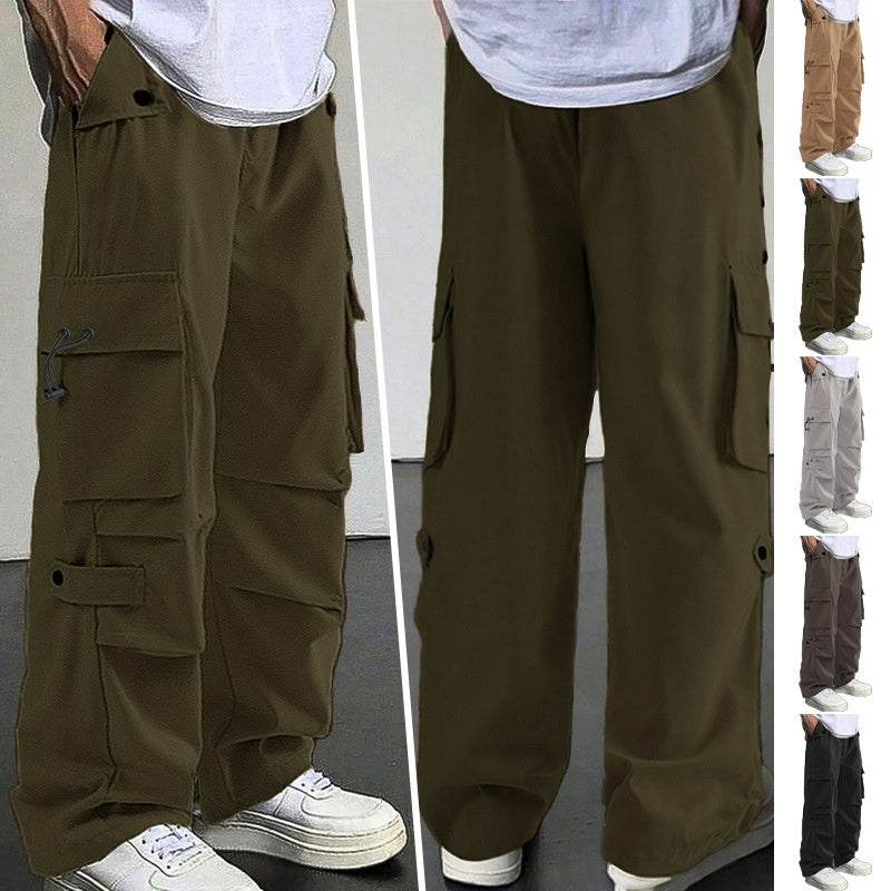 Men's loose fit cargo pants with multiple pockets in olive green, styled with white sneakers and white t-shirt