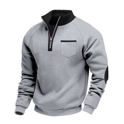 Grey quarter-zip sweatshirt with black collar, chest pocket trim, and elbow patches on white background