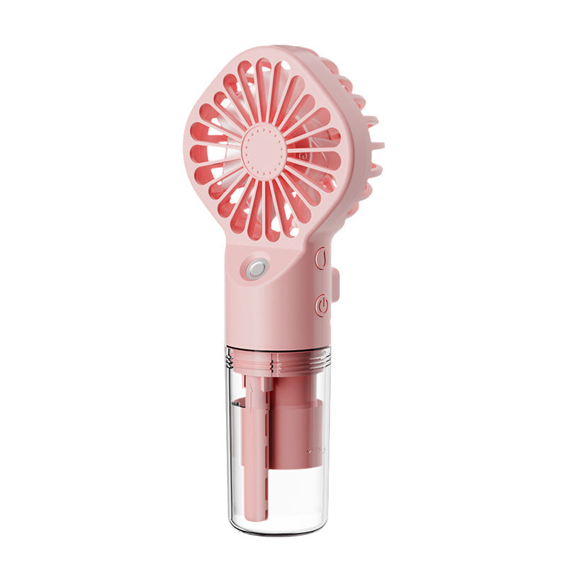 Compact pink handheld misting fan with transparent water tank and control buttons
