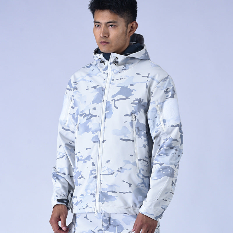 Man wearing white and grey camouflage hooded jacket with zipper and pockets