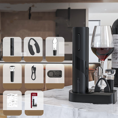 electric black wine opener set with accessories and wine glass on kitchen countertop