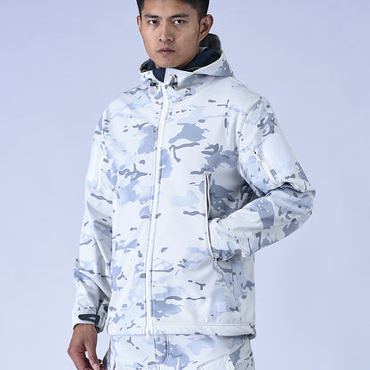 Man wearing white and gray urban camouflage hooded jacket with zippered pockets