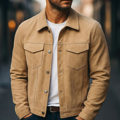 Man wearing beige suede jacket with front pockets and button closure over white t-shirt