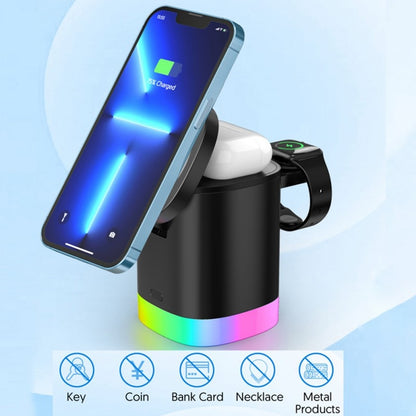 black wireless charging station with RGB light base charging a smartphone, wireless earbuds, and a smartwatch
