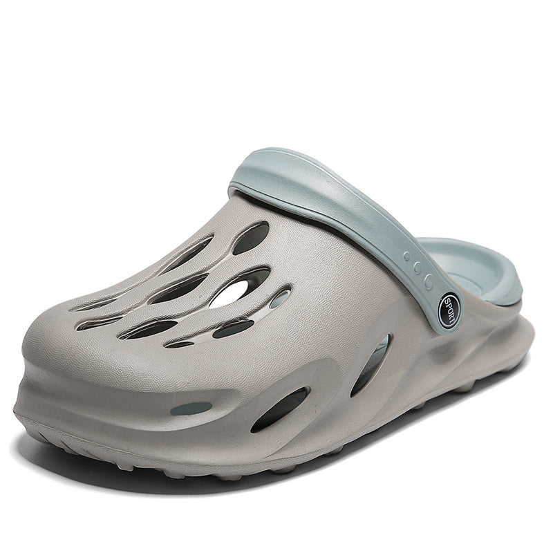 Light grey breathable foam clog with blue adjustable strap and ventilation holes