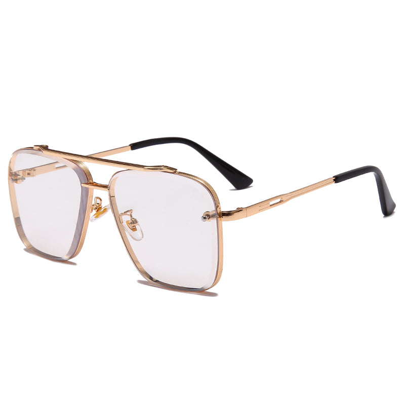 Square clear lens eyeglasses with gold metal frame and black temple tips on white background