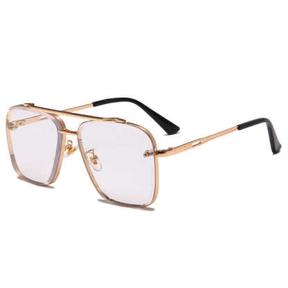 Square clear lens eyeglasses with gold metal frame and black temple tips on white background