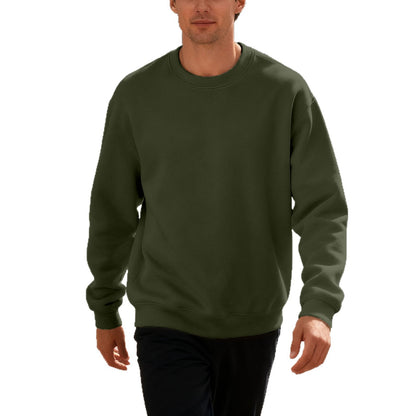 Male model wearing a plain olive green crewneck sweatshirt with long sleeves and black pants