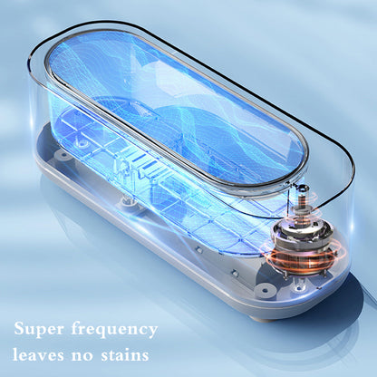 Transparent cleaning device with blue ultrasonic waves and rotating motor components