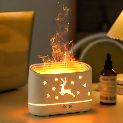 White tabletop humidifier with reindeer and snowflake cutouts emitting mist, warm ambient lighting