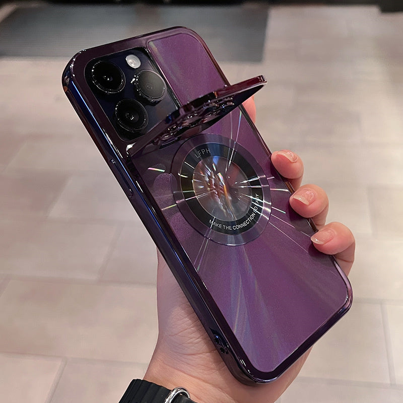 Hand holding purple smartphone case with circular pop-up ring and triple camera lenses