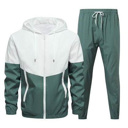 Men's two-tone white and green zip-up hoodie and matching green jogger pants sportswear set