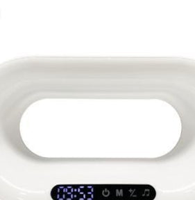 Modern white digital alarm clock with black control panel and blue LED display on a white background
