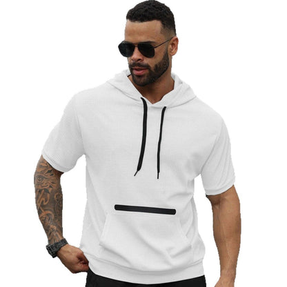 Man wearing white short sleeve hoodie with black drawstrings and sunglasses, showing arm tattoos