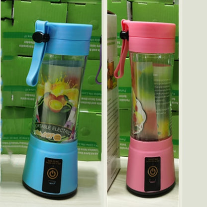 Portable electric blenders in blue and pink with fruit graphics, displayed against green boxes
