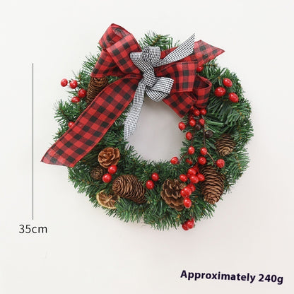 35cm Christmas wreath decorated with pinecones, red berries, and red and black gingham bows