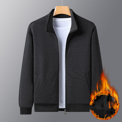 Black zip-up jacket with side pockets over white t-shirt, fleece fabric with fire graphic on sleeve