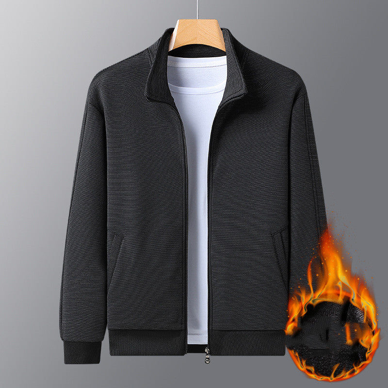 Black zip-up jacket over white t-shirt on hanger with fire flame graphic on sleeve