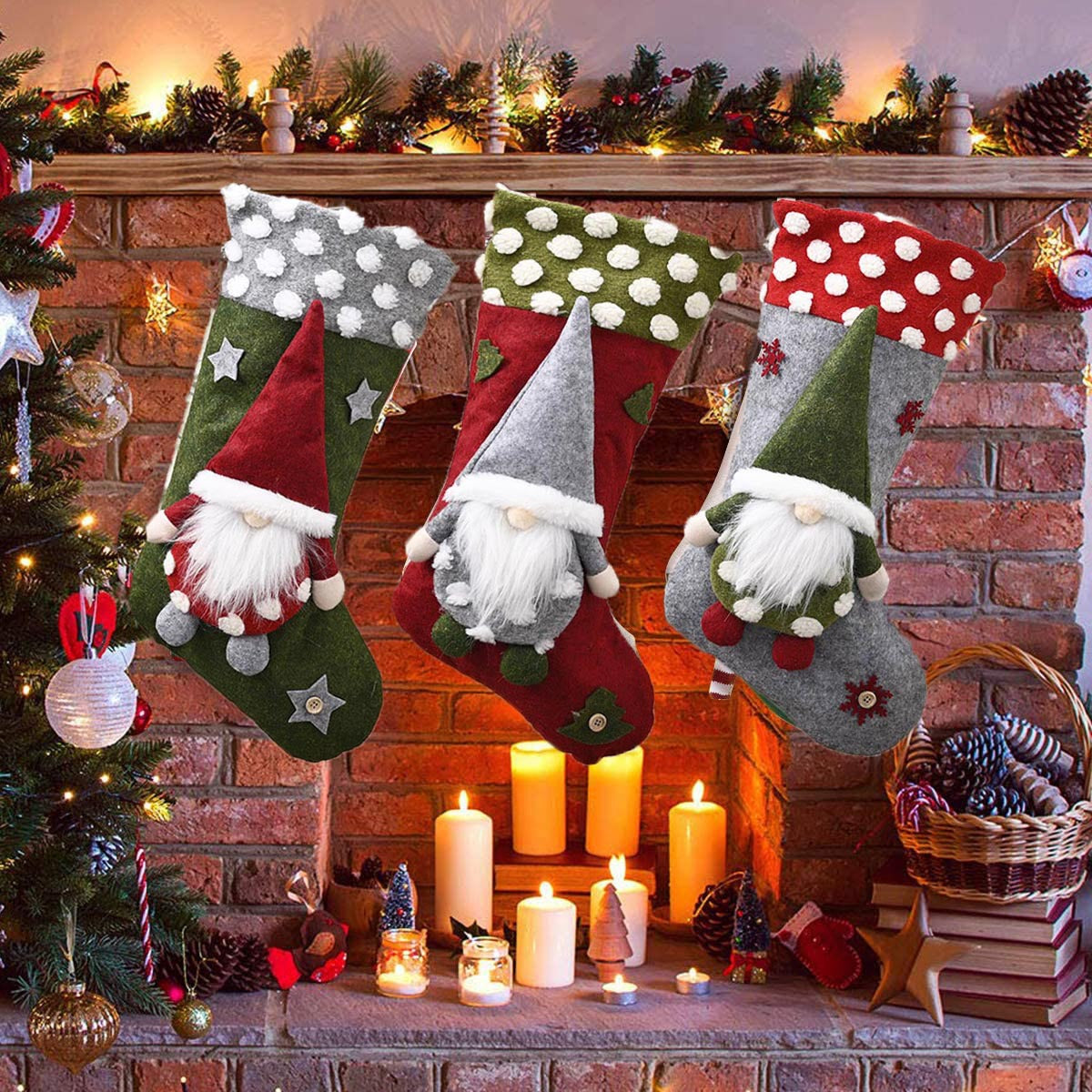 Three gnome Christmas stockings hanging on a decorated brick fireplace mantle with candles and holiday decor