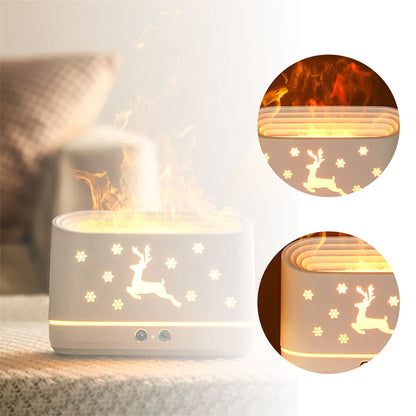 White humidifier with glowing reindeer and snowflake design emitting warm mist on cozy surface