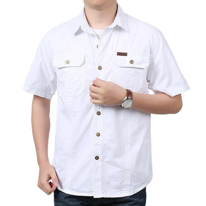 man wearing casual white short sleeve button-up shirt with chest pockets and brown leather watch