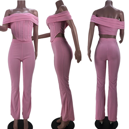 Pink off-shoulder crop top and high-waisted pants two-piece set on mannequin in front, side, and back views