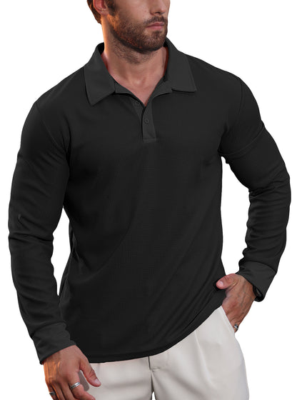 Man wearing black long-sleeve textured polo shirt and light beige pants with rings on fingers