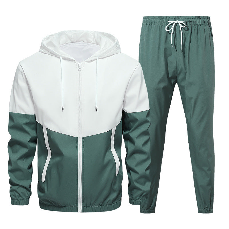 Two-tone men's tracksuit with white hooded jacket and green pants with elastic and drawstring waist