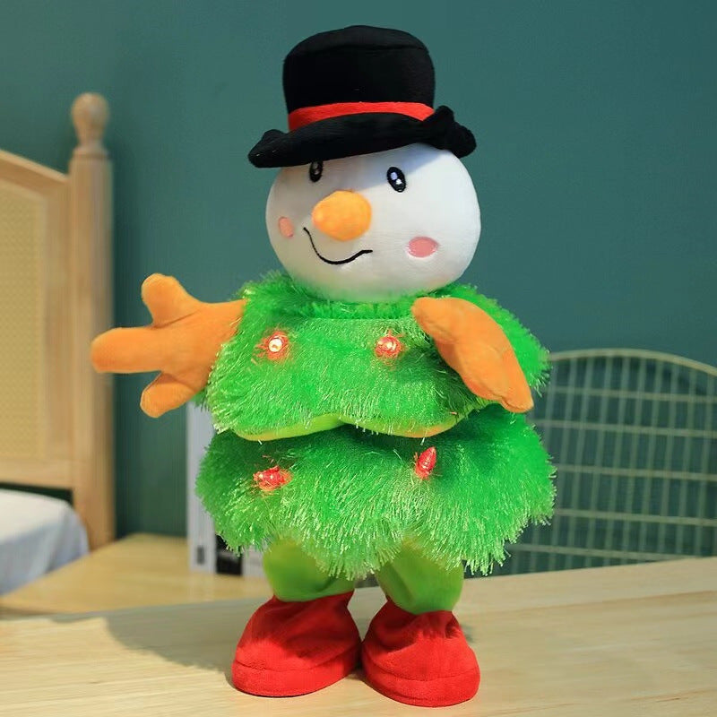Plush snowman toy with black hat, orange nose, green fuzzy outfit, and red shoes on table