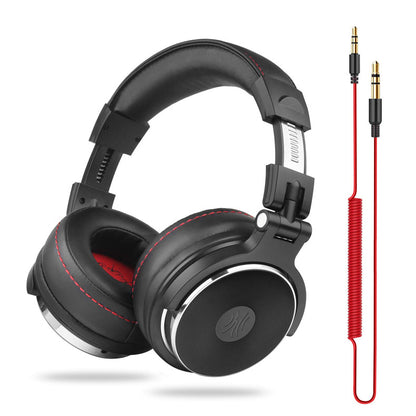 Black wired studio headphones with red stitching and coiled red audio cable with gold plugs