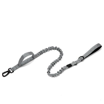 Gray adjustable tactical dog leash with padded handle and shock-absorbing bungee design