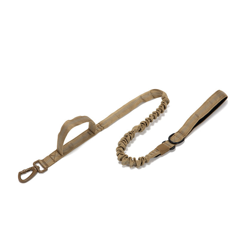 tan tactical dog leash with padded handle, shock-absorbing bungee design, and metal clasp