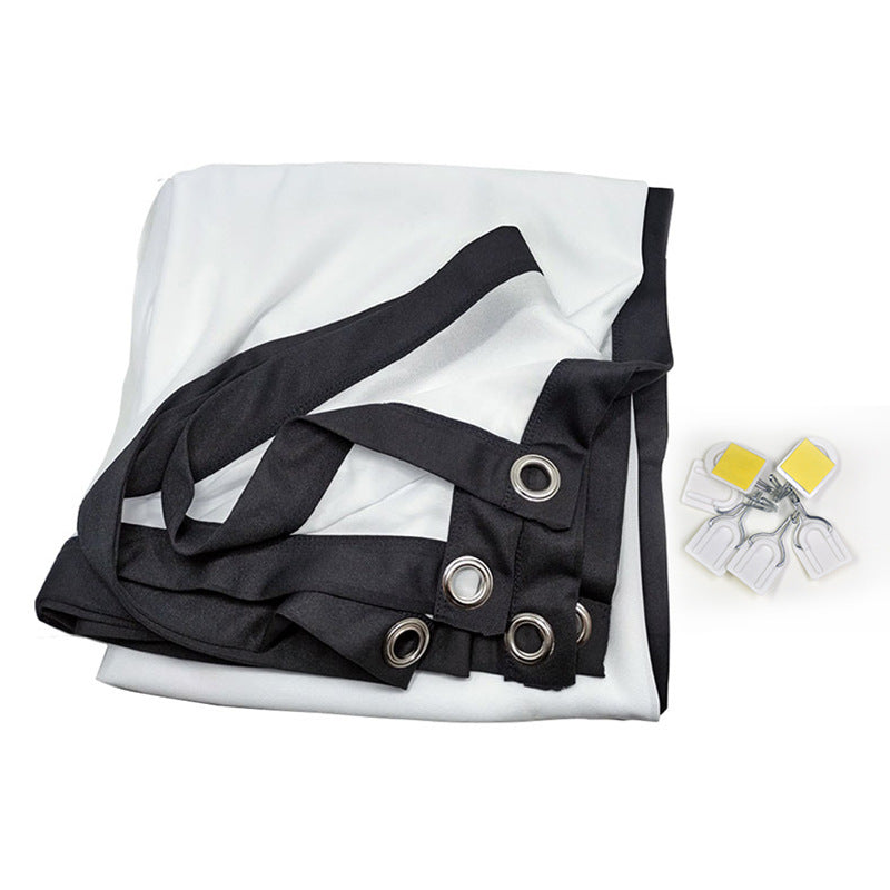 Folded 100-inch portable projector screen with black border and metal grommets, includes mounting clips