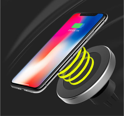 Smartphone wirelessly charging on magnetic wireless car charger mount with black and silver design