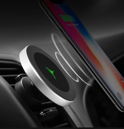 Silver magnetic wireless car charger mount attached to vent charging smartphone at 75%