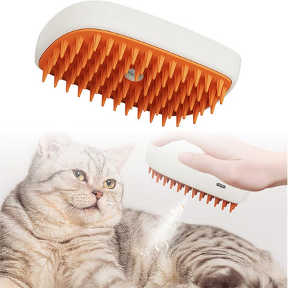 USB rechargeable pet grooming brush with orange silicone bristles used on a gray tabby cat