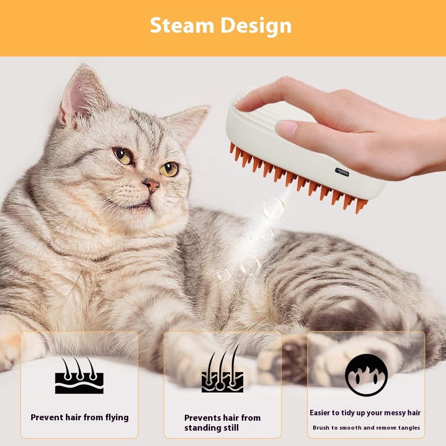 Hand holding white and orange USB rechargeable pet steam brush grooming a gray tabby cat with visible steam
