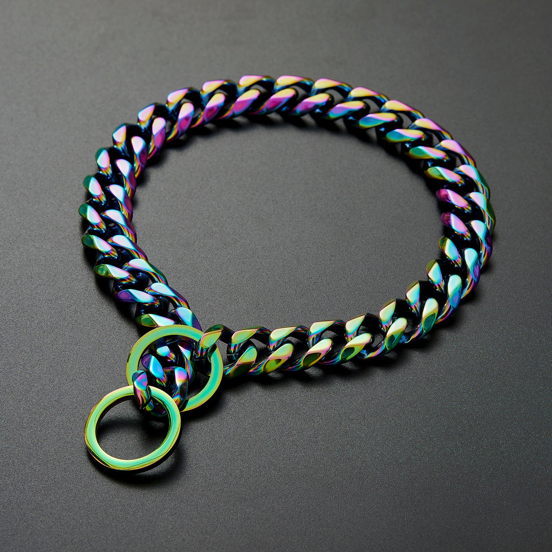 Rainbow stainless steel chain dog collar with two rings on dark background