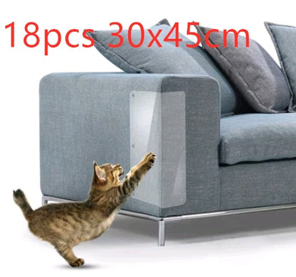 Cat claw protector clear PVC sheet on blue sofa arm preventing scratches with playful cat
