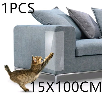 Gray sofa with clear PVC cat claw protector on the armrest and a playful tabby cat reaching up