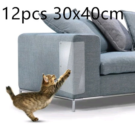 Tabby cat reaching to scratch a clear PVC sofa protector on a blue fabric couch armrest