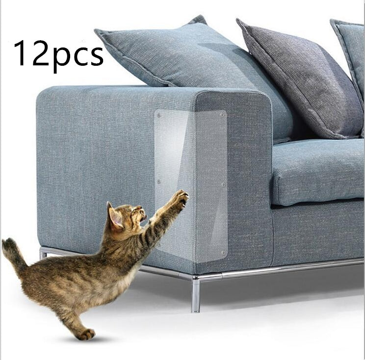 Tabby cat scratching a blue fabric sofa protected by a clear PVC cat claw protector panel