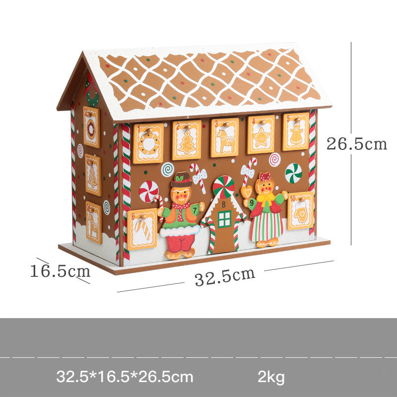 Wooden gingerbread house Christmas advent calendar with candy decorations and numbered doors