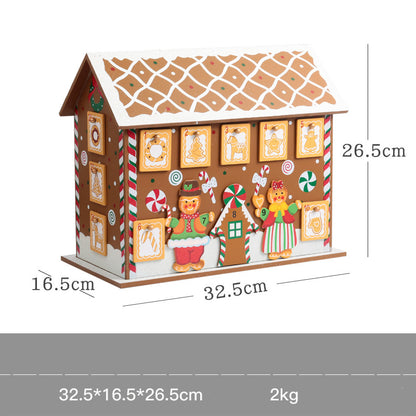 Wooden gingerbread house Christmas advent calendar with candy decorations and numbered doors