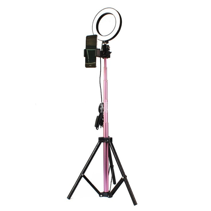 Pink extendable tripod stand with ring light and smartphone holder for video recording